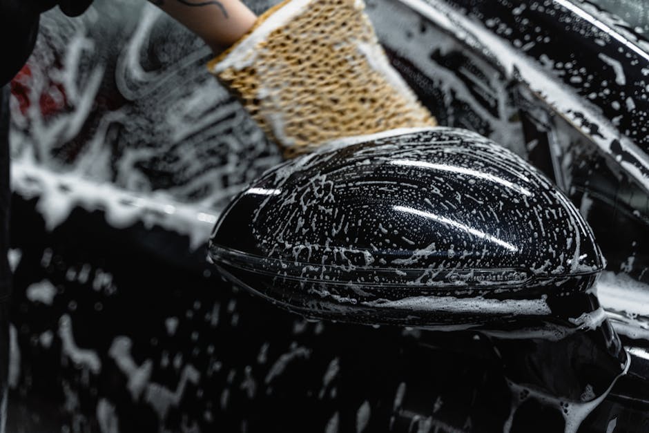 Luxury car receiving a premium hand car wash